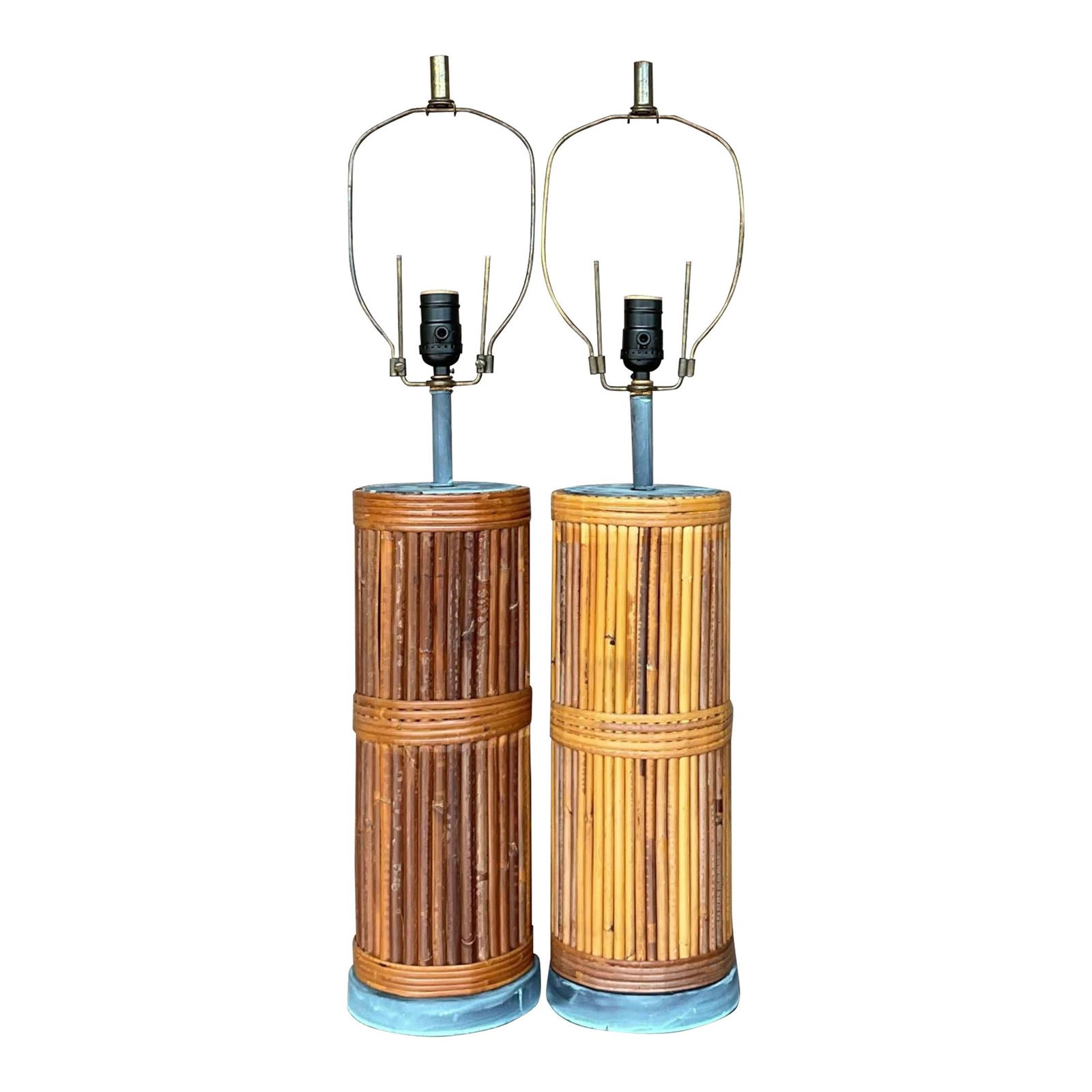 Pair of Vintage Coastal Pencil Reed Table Lamps in Chocolate: Pair of Vintage Coastal Pencil Reed Table Lamps in Chocolate Add a touch of coastal charm to your decor with this exquisite pair of Vintage Pencil Reed Table Lamps. Inspired by classic American coasta