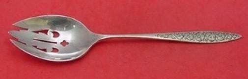 Wallace Spanish Lace Sterling Silver Pierced Serving Spoon 8.5": Wallace Spanish Lace Sterling Silver Pierced Serving Spoon 8.5" This exquisite pierced serving spoon features the elegant Spanish Lace pattern by Wallace. Crafted from high-quality sterling silver, it