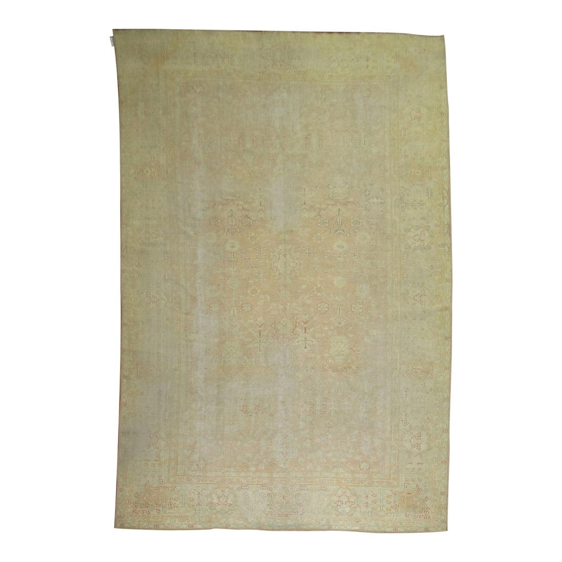 Large Antique Turkish Oushak Rug Circa 1910 Pale Peach Hand-Woven: Large Antique Turkish Oushak Rug Circa 1910 Pale Peach Hand-Woven Discover a stunning early 20th century Turkish Oushak rug, elegantly worn and featuring a soft pale peach hue. This oversized piece me