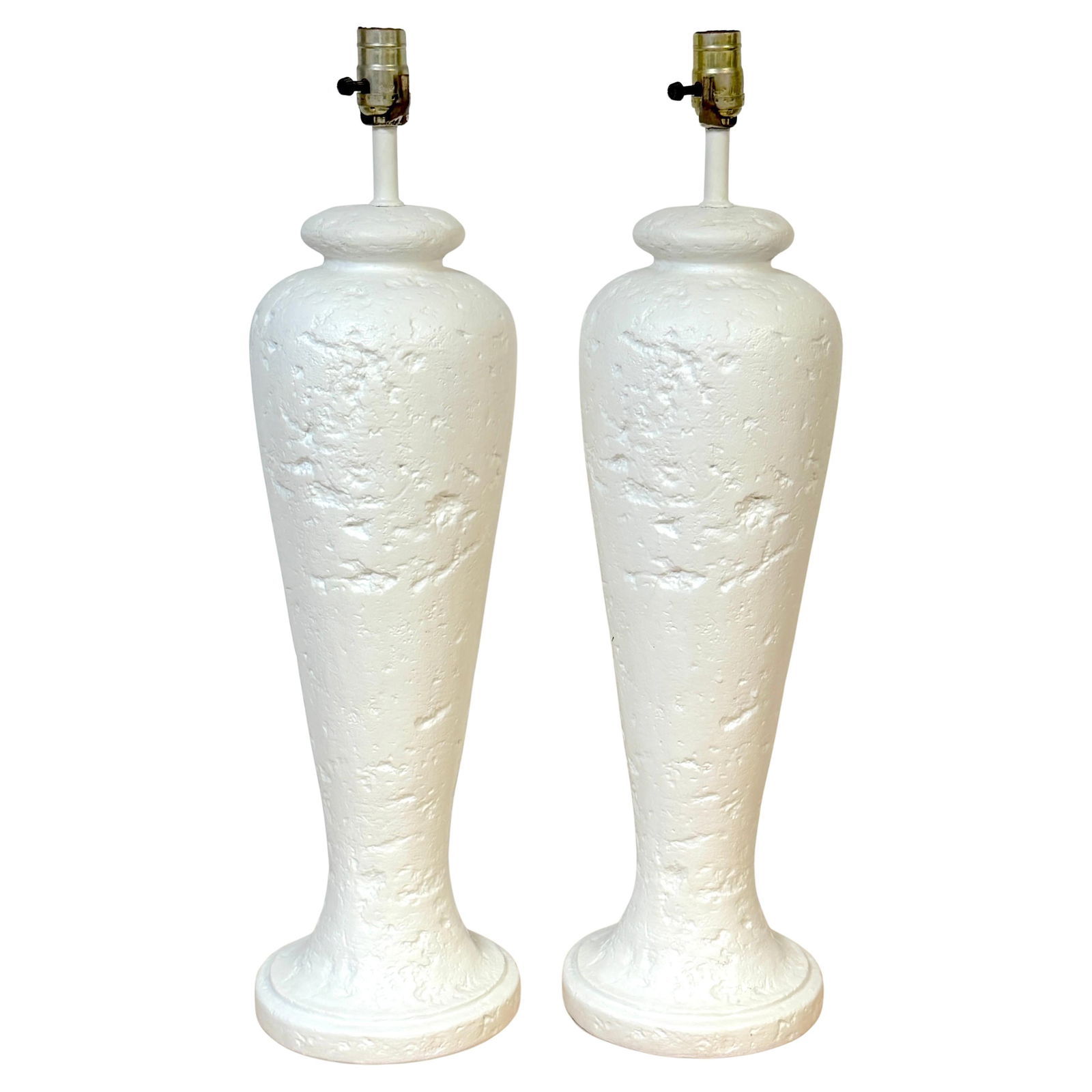 Large Set of 2 Postmodern Coquina Stone Plaster Lamps 1980s: Large Set of 2 Postmodern Coquina Stone Plaster Lamps 1980s This large pair of Postmodern Coquina Stone Style lamps, crafted in painted plaster, features a striking texture reminiscent of natural coqu