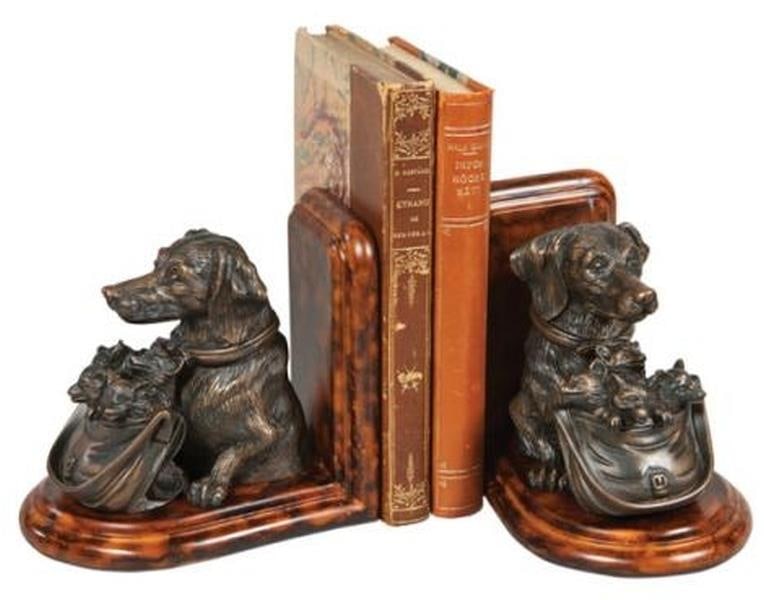 Charming Hand-Cast Resin Dog and Fox Kits Bookends Lodge Style: Charming Hand-Cast Resin Dog and Fox Kits Bookends Lodge Style Add a charming touch to your home decor with these delightful hand-cast bookends featuring a dog with a basket of fox kits. Crafted from