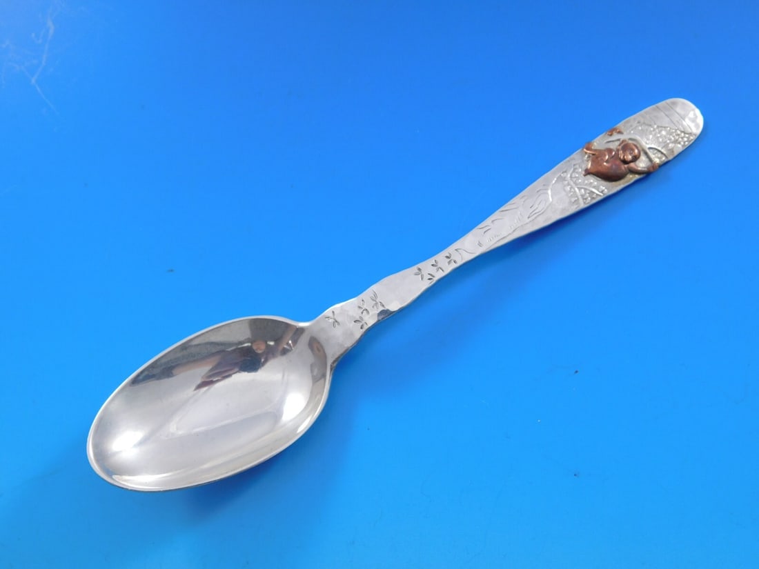 Tiffany & Co Sterling Silver Teaspoon Lap Over Edge with Copper Monkey: Tiffany & Co Sterling Silver Teaspoon Lap Over Edge with Copper Monkey Discover this exquisite Sterling Silver Teaspoon by Tiffany & Co., crafted in the stunning 'Lap Over Edge Mixed Metals' pattern.