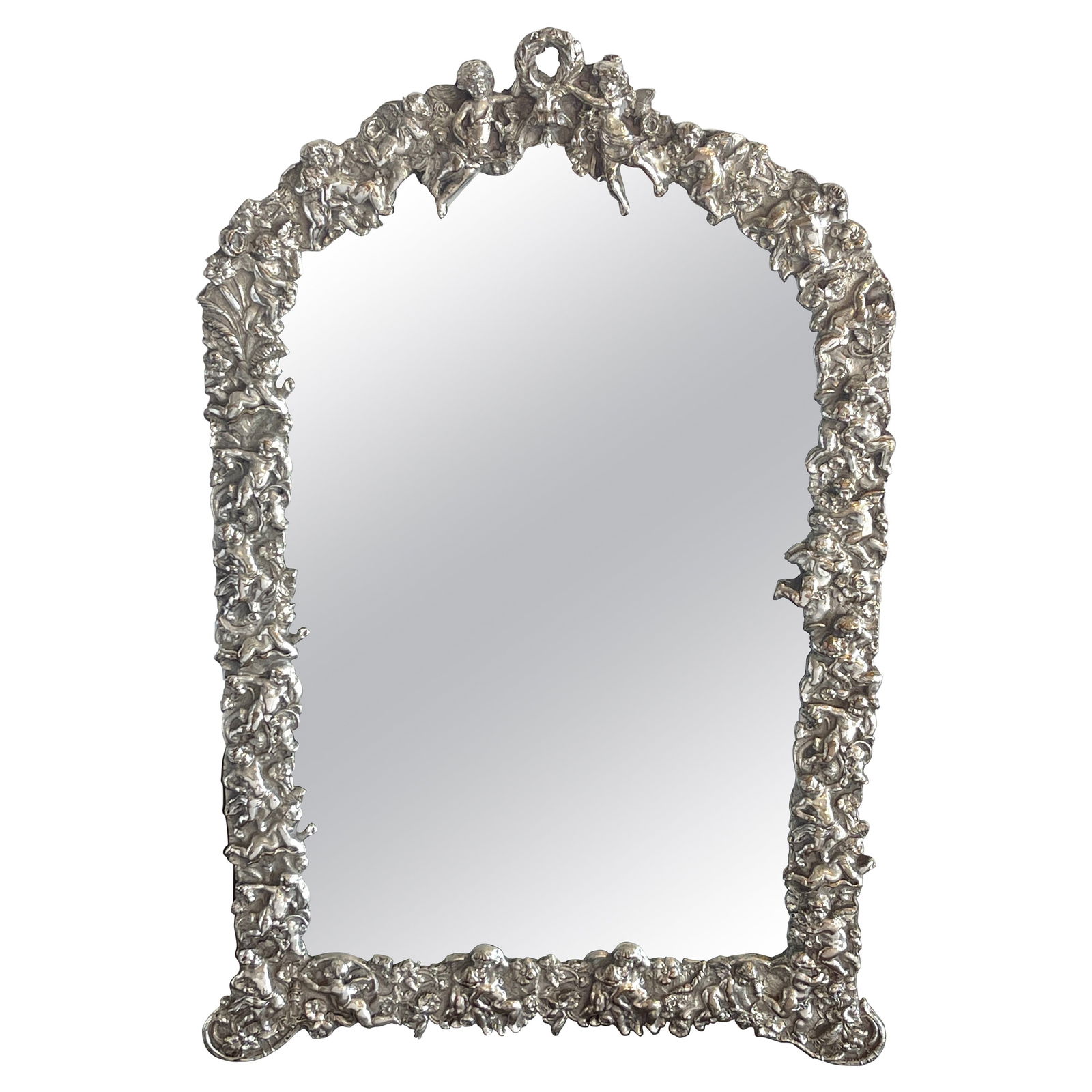 19th Century French Silverplated Putti Motif Mirror High Victorian Style: 19th Century French Silverplated Putti Motif Mirror High Victorian Style This exquisite 19th-century French dressing mirror features a charming putti motif, characteristic of the High Victorian style.