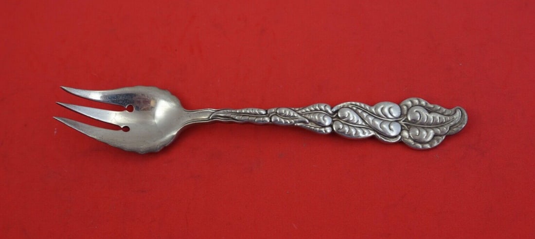 Tiffany and Co Ailanthus Sterling Silver Salad Fork 3-Tine Ruffled Shoulder: Tiffany and Co Ailanthus Sterling Silver Salad Fork 3-Tine Ruffled Shoulder This exquisite salad fork is crafted in sterling silver by Tiffany and Co., featuring the elegant Ailanthus pattern. With a