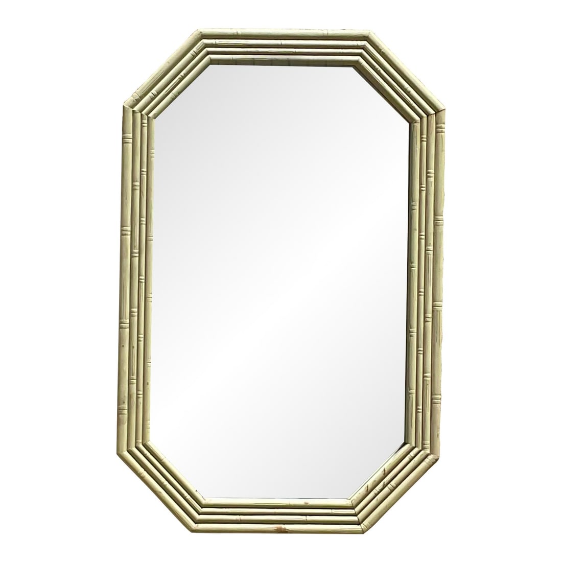 Vintage Octagonal Bamboo Wall Mirror in Eggshell Finish: Vintage Octagonal Bamboo Wall Mirror in Eggshell Finish This vintage wall mirror showcases a stunning octagonal shape, featuring a hand-carved bamboo design that adds a coastal charm to any space. It