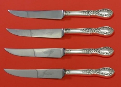 Manchester American Beauty Sterling Silver Steak Knife Set 4pc: Manchester American Beauty Sterling Silver Steak Knife Set 4pc Enhance your dining experience with this exquisite American Beauty Sterling Silver Steak Knife Set by Manchester. This custom-made set in