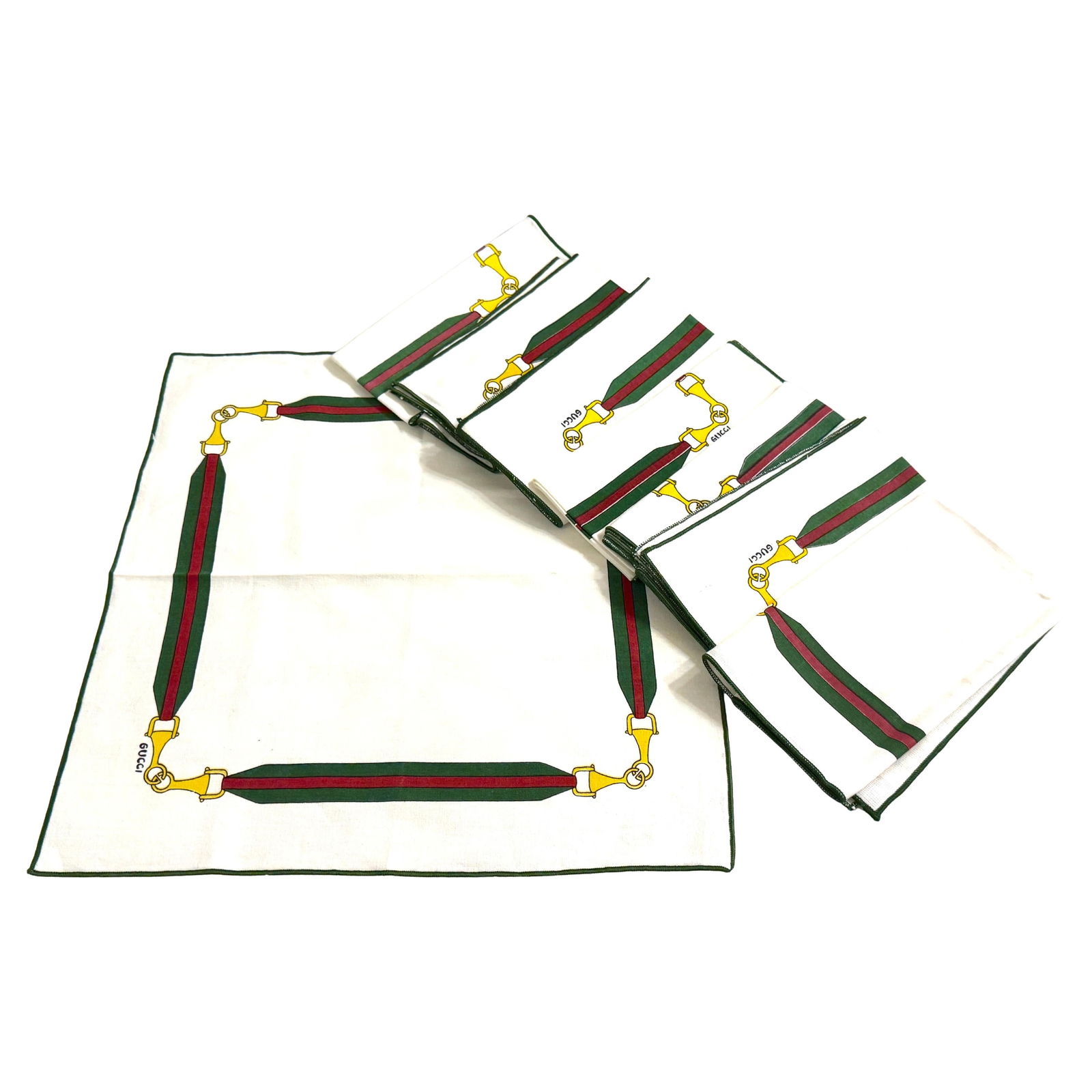 Set of 8 Vintage Gucci Equestrian Napkins with Horsebit Motif Signed 1980s: Set of 8 Vintage Gucci Equestrian Napkins with Horsebit Motif Signed 1980s This exquisite set of eight vintage napkins, attributed to Aldo Gucci, showcases the iconic equestrian horsebit motif in a vi