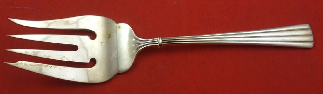 Cartier Des Must Sterling Silver Serving Fork 8 1/2 inches: Cartier Des Must Sterling Silver Serving Fork 8 1/2 inches This exquisite serving fork, crafted by Cartier, features the elegant "Des Must" pattern and is made from high-quality sterling silver. Measu