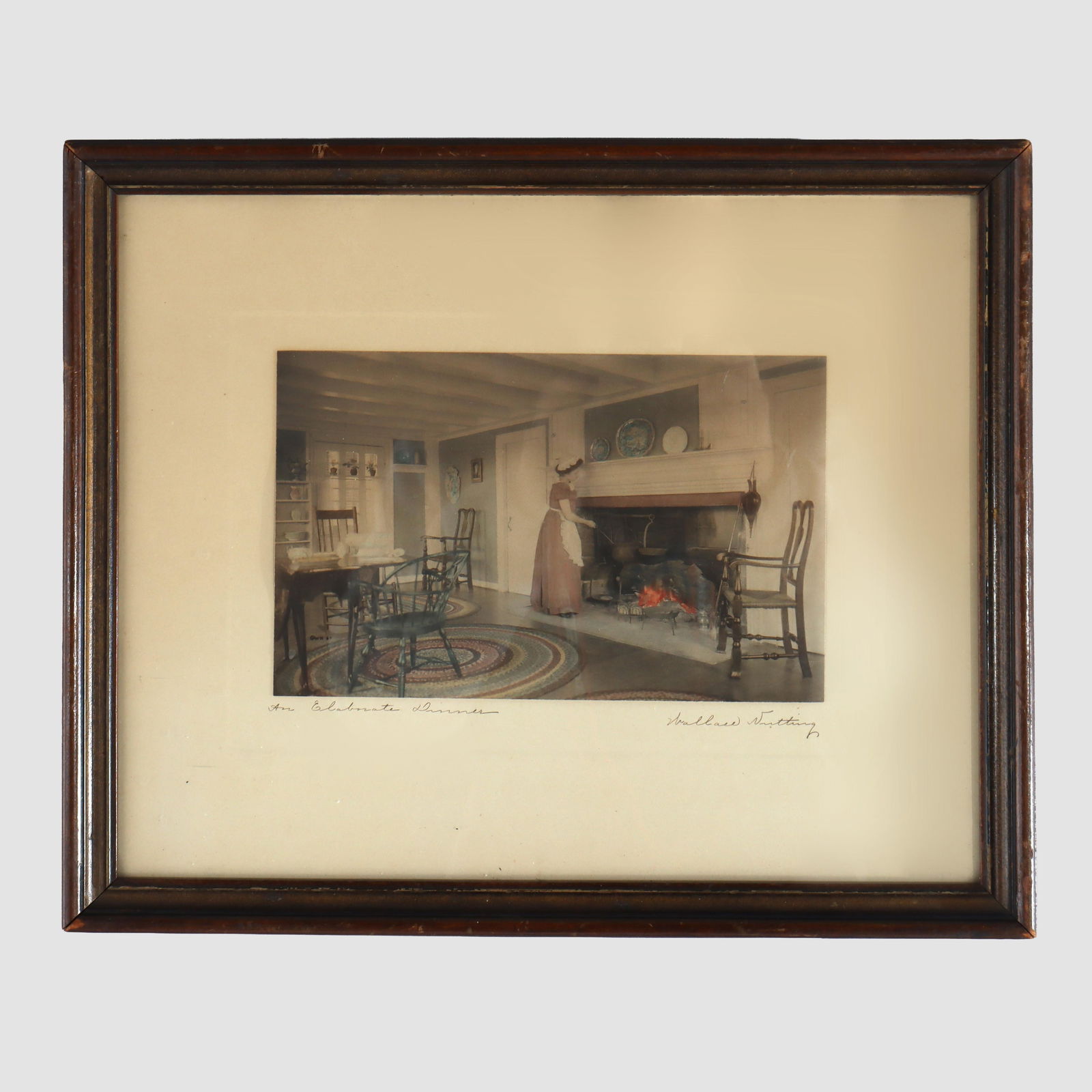 Hand-Colored Wallace Nutting Signed Print An Elaborate Dinner Circa 1900: Hand-Colored Wallace Nutting Signed Print An Elaborate Dinner Circa 1900 This is an antique hand-colored photograph by Wallace Nutting, titled 'An Elaborate Dinner.' Created around 1900, the print dep