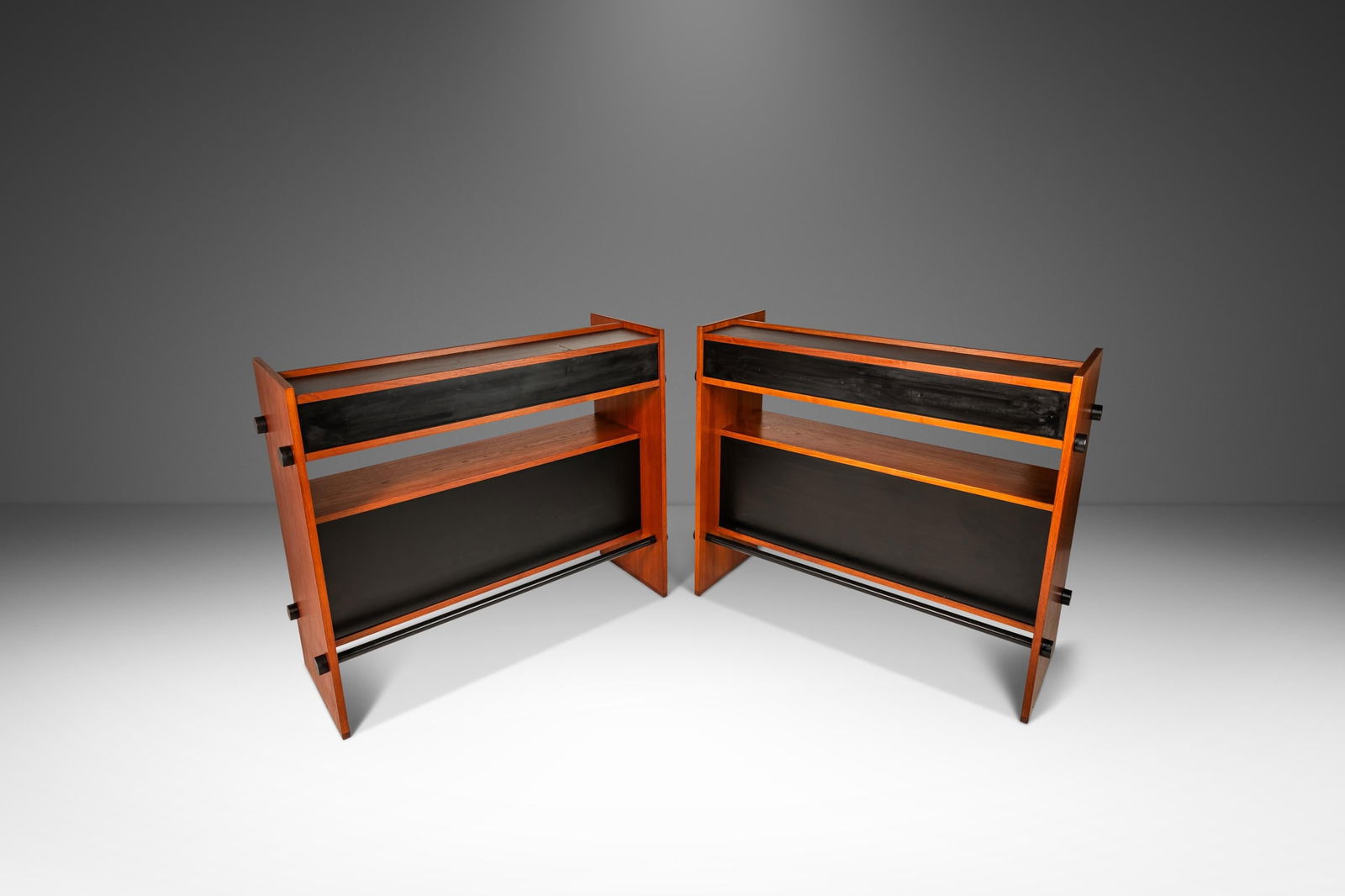 Danish Mid-Century Modern Minimalist Teak Dry Bar Set of 2 1970s: Danish Mid-Century Modern Minimalist Teak Dry Bar Set of 2 1970s Presenting a rare set of two Danish Mid-Century Modern dry bars, characterized by their minimalist design and contrasting tones. Crafte