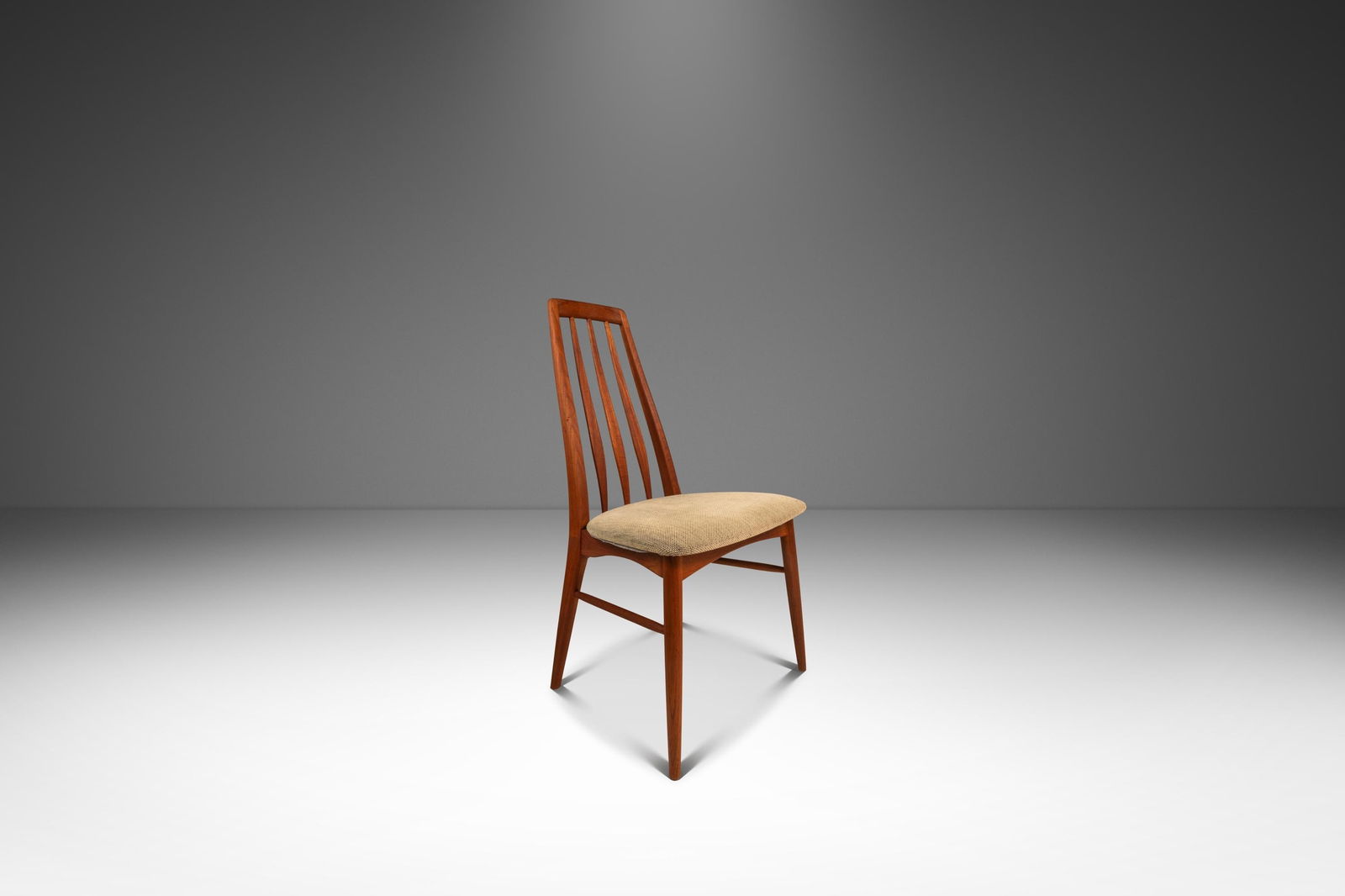 Danish Mid-Century Modern Eva Dining Chair by Niels Koefoed in Teak: Danish Mid-Century Modern Eva Dining Chair by Niels Koefoed in Teak Introducing the iconic "Eva" dining chair, a masterpiece designed by Niels Koefoed for Koefoeds Hornslet, crafted in Denmark during