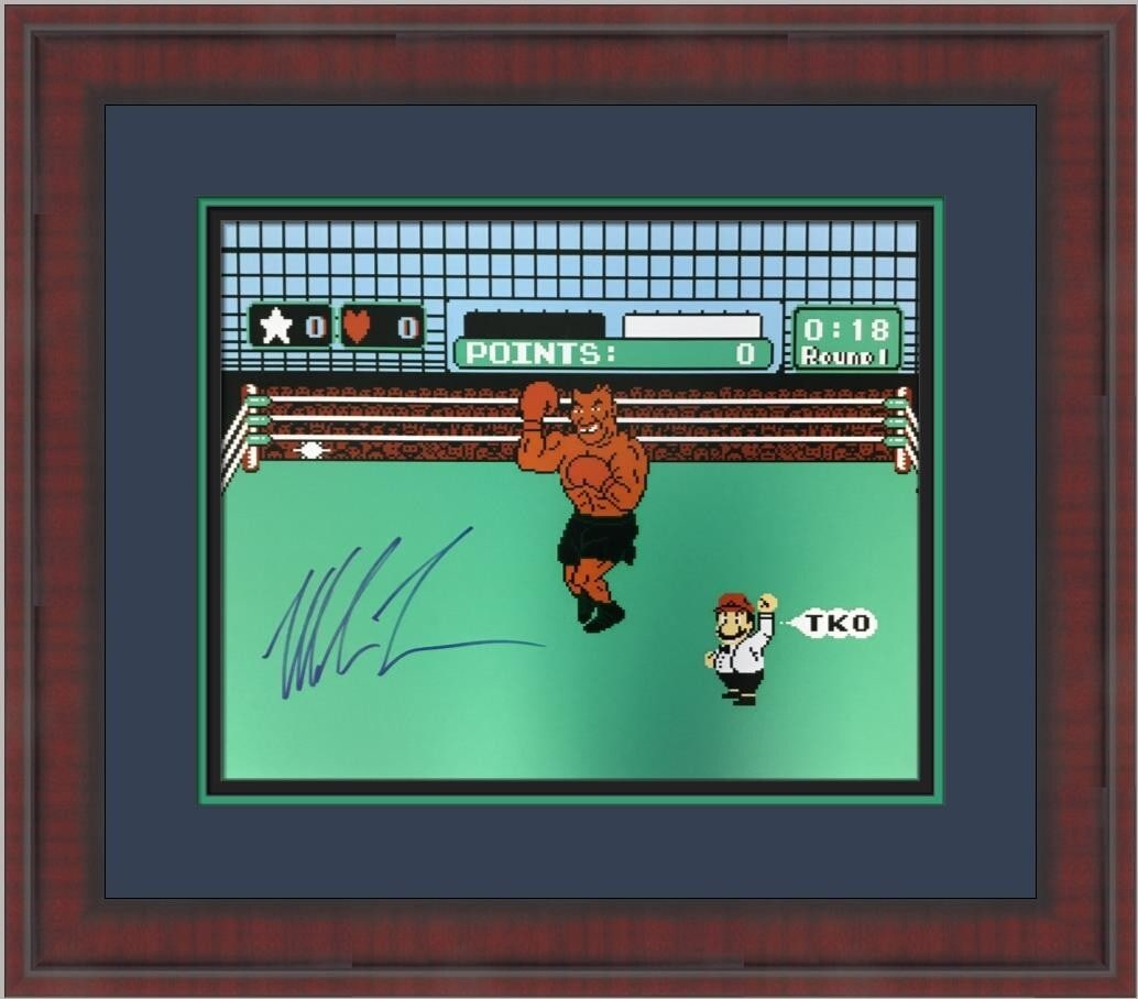 Mike Tyson Signed 16x20 Photo Custom Framed TKO Nintendo Boxing: Mike Tyson Signed 16x20 Photo Custom Framed TKO Nintendo Boxing Celebrate the iconic sport of boxing with this custom-framed photograph featuring Mike Tyson, signed by the legendary athlete himself. T