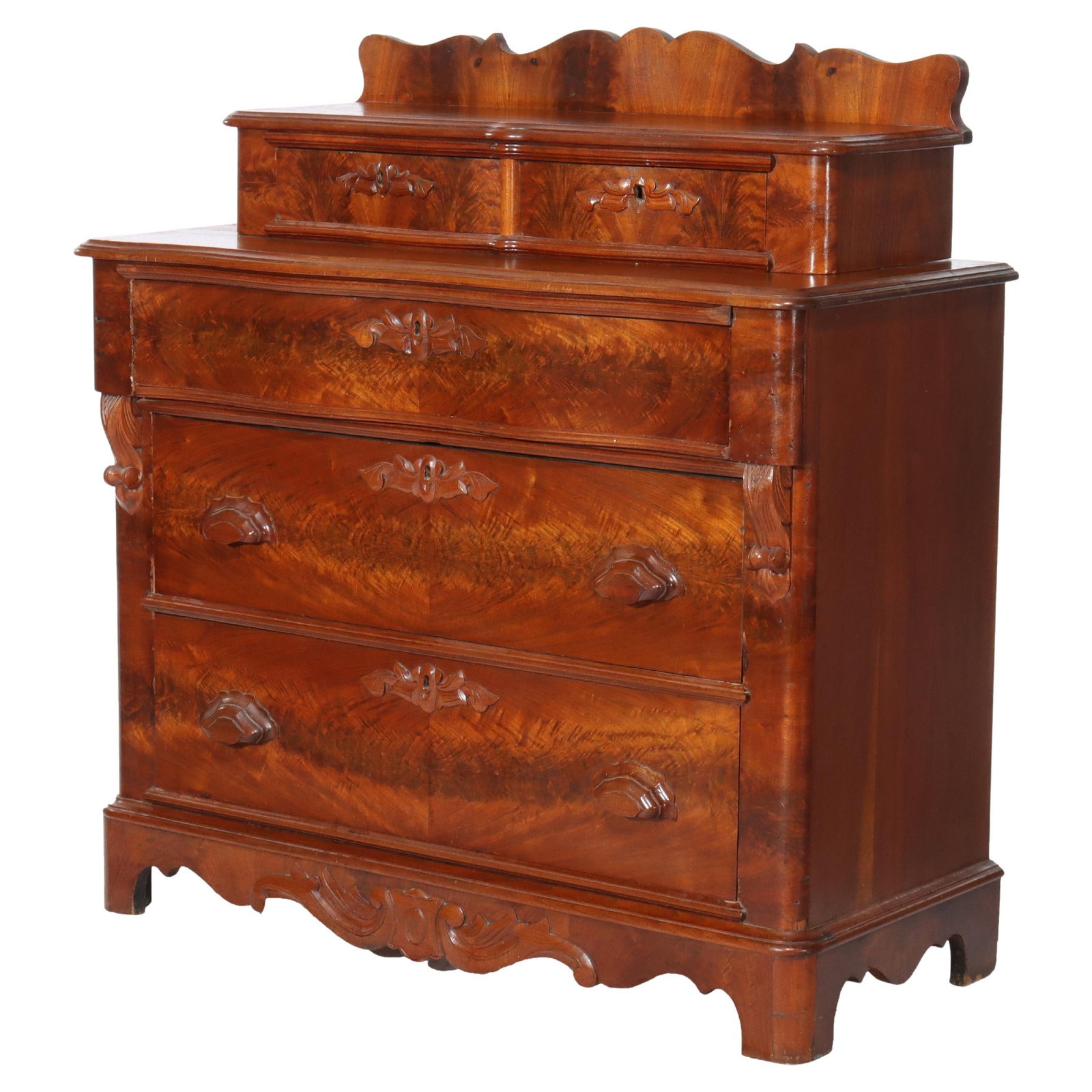 Victorian Antique Flame Mahogany Five Drawer Chest C1880: Victorian Antique Flame Mahogany Five Drawer Chest C1880 This exquisite Antique Victorian Carved Flame Mahogany Five Drawer Chest, dating back to circa 1880, showcases the elegance and craftsmanship o
