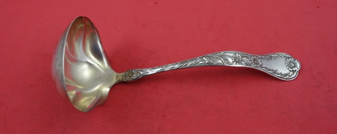Gorham Marguerite Sterling Silver Gravy Ladle 7.5" Monogrammed: Gorham Marguerite Sterling Silver Gravy Ladle 7.5" Monogrammed Introducing the Marguerite Gravy Ladle by Gorham, an exquisite piece crafted from sterling silver. This ladle measures 7 1/2 inches and s