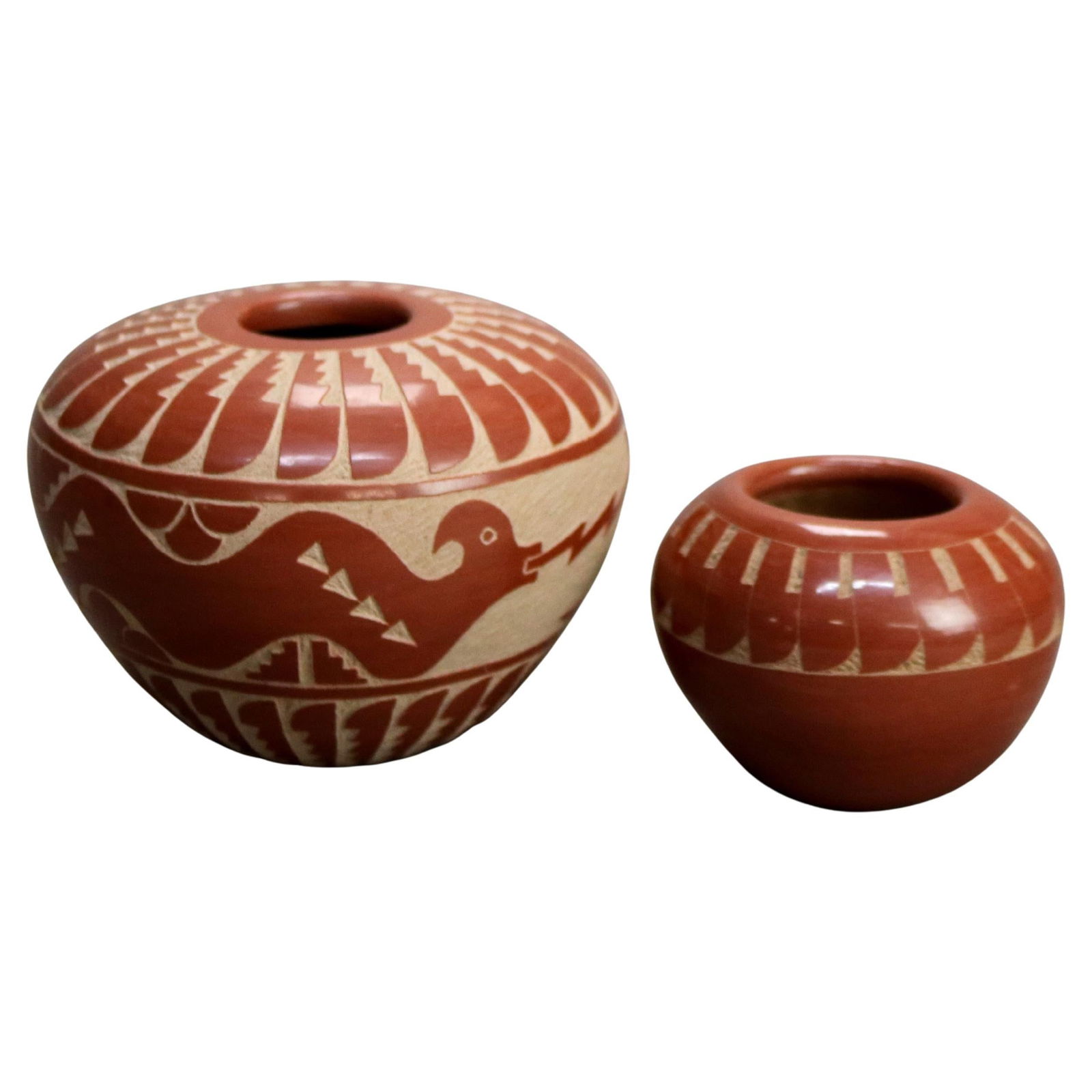 Artist Signed Set of 2 Southwestern Native American Redware Bowls 20th Century: Artist Signed Set of 2 Southwestern Native American Redware Bowls 20th Century This exquisite set of two Southwestern Native American redware Pueblo pottery bowls showcases the rich artistic heritage
