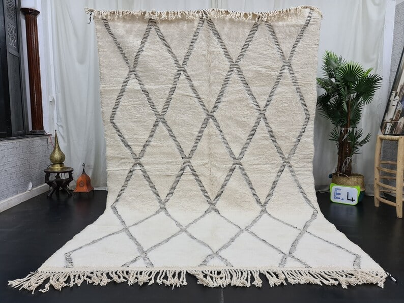 Handwoven Soft White Geometric Pattern Rug 10 x 6.56 Feet Morocco: Handwoven Soft White Geometric Pattern Rug 10 x 6.56 Feet Morocco Discover the beauty of this Elegant Soft White Rug featuring an engraved geometric pattern, handwoven in the breathtaking Atlas Mounta