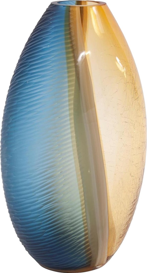 Howard Elliott Mirina Hand-Blown Oval Glass Vase Amber Blue Finish: Howard Elliott Mirina Hand-Blown Oval Glass Vase Amber Blue Finish Introducing the Mirina Oval Glass Vase, a stunning piece that combines traditional style with modern craftsmanship. This exquisite va
