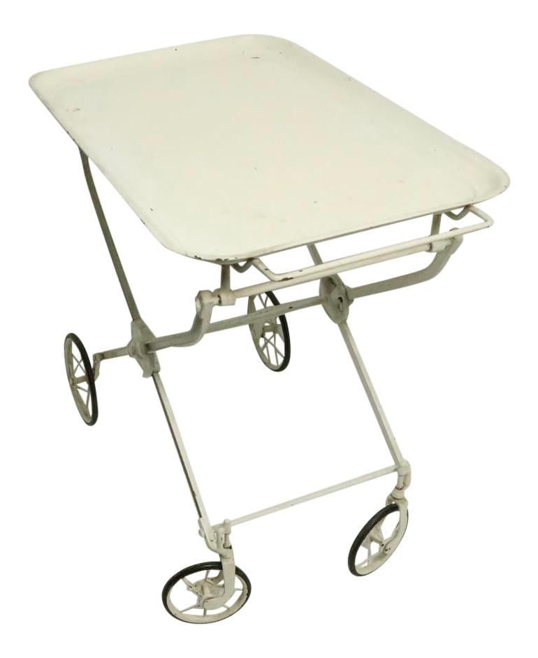 Vintage Industrial Hospital Cart Cast Iron Steel Antique White: Vintage Industrial Hospital Cart Cast Iron Steel Antique White Discover this unique early industrial hospital cart, expertly crafted from durable cast iron and topped with a sturdy steel tray. Featuri