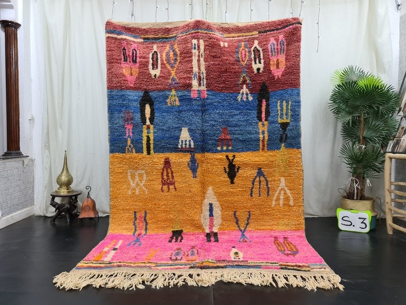 Authentic Colorful Handmade Moroccan Berber Wool Rug 8 x 5 Feet: Authentic Colorful Handmade Moroccan Berber Wool Rug 8 x 5 Feet Transform your living space with this elegant and vibrant handmade Moroccan Berber wool rug. Crafted by local Berber women weavers in th