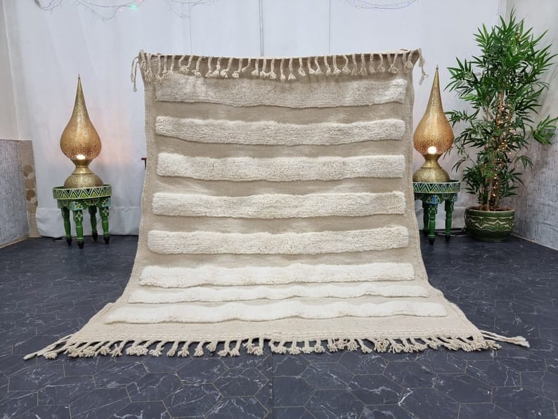 Authentic Moroccan Berber Wool Engraved Handmade Area Rug: Authentic Moroccan Berber Wool Engraved Handmade Area Rug Experience the elegance of this authentic, handwoven Moroccan Berber rug, crafted by skilled local weavers in the Atlas Mountains. This