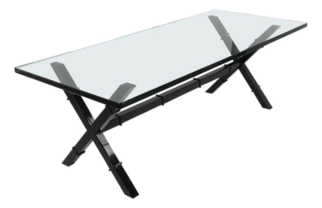 Glass Coffee Table with Black Metal X Base and Plate Top 1970s: Glass Coffee Table with Black Metal X Base and Plate Top 1970s This 1970s coffee table features a sophisticated X-shaped base with a newly powder coated black metal finish, paired with a plate glass t