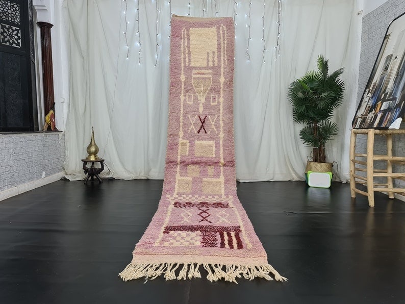 Handmade Light Pink Moroccan Berber Runner Rug 2 x 10 ft: Handmade Light Pink Moroccan Berber Runner Rug 2 x 10 ft Enhance your space with this exquisite Light Pink Handmade Moroccan Berber Runner Rug. Crafted by skilled local Berber women weavers in the sce