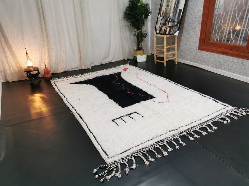 Authentic Handmade Moroccan Berber Wool Rug 9.84 x 6.56 Feet: Authentic Handmade Moroccan Berber Wool Rug 9.84 x 6.56 Feet Discover the beauty of this stunning authentic handmade Moroccan Berber wool rug. Crafted in the Atlas Mountains by skilled local Berber wo