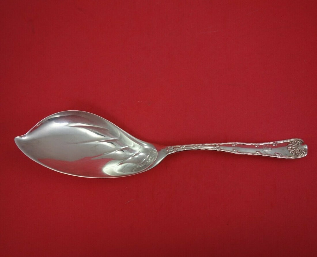 Tiffany & Co Wave Edge Sterling Silver Ice Cream Server 11 1/8": Tiffany & Co Wave Edge Sterling Silver Ice Cream Server 11 1/8" Presenting the exquisite Wave Edge Ice Cream Server by Tiffany & Co., crafted from sterling silver and measuring 11 1/8". This remarkabl