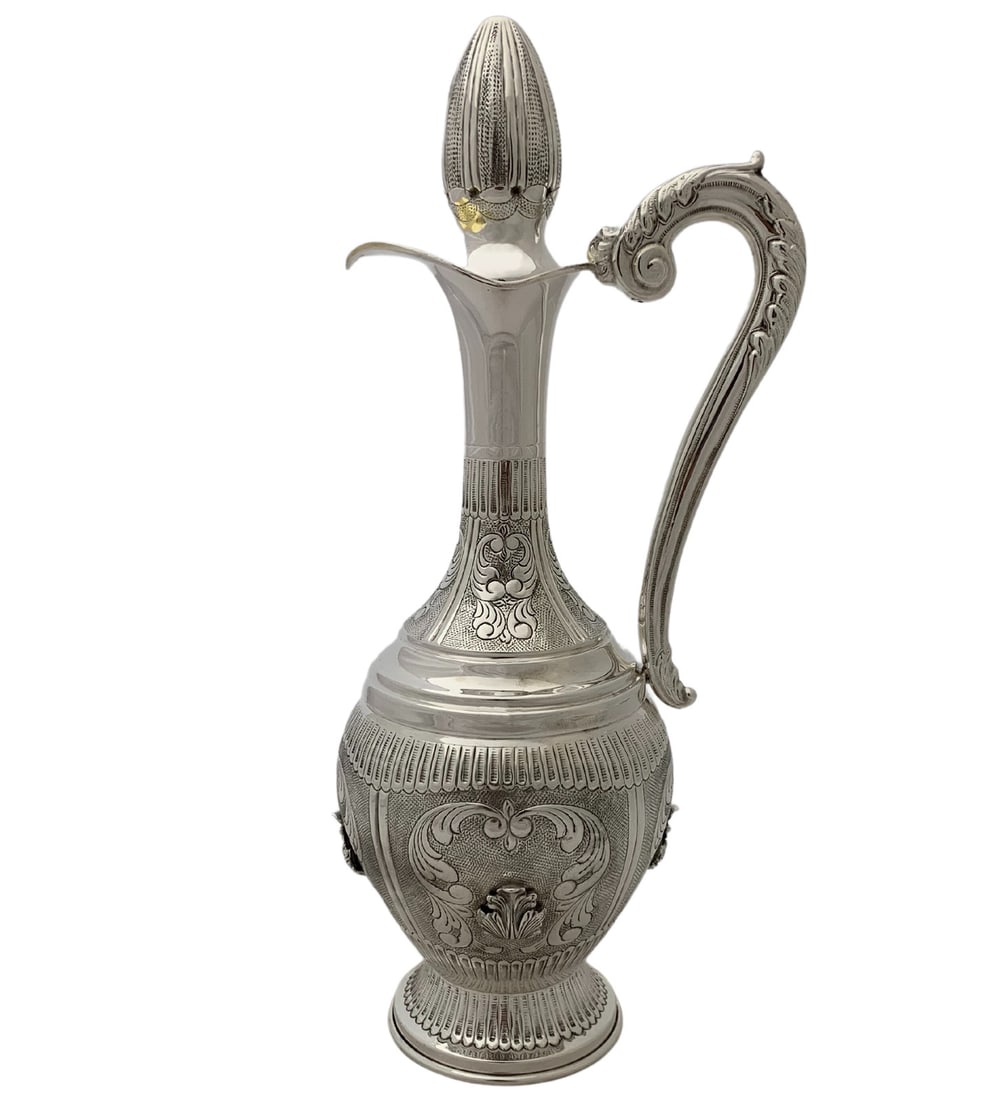 Handmade 925 Sterling Silver Wine Bottle with Chased Leaf Design: Handmade 925 Sterling Silver Wine Bottle with Chased Leaf Design This exquisite wine bottle is crafted from fine 925 sterling silver, showcasing intricate handmade chased leaf applique designs that en