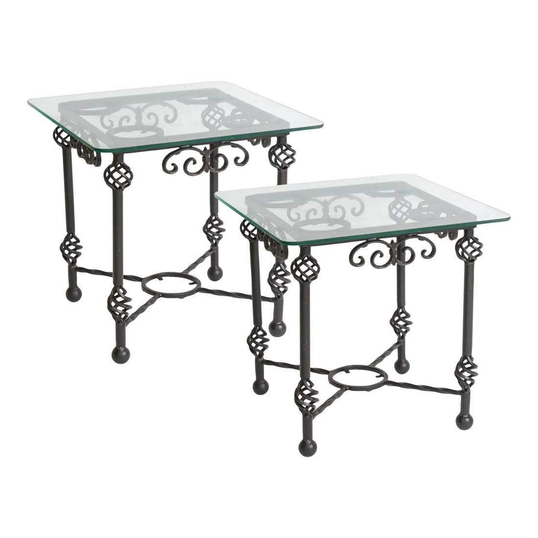 1950s French Giacometti Style Wrought Iron Side Tables with Glass Tops: 1950s French Giacometti Style Wrought Iron Side Tables with Glass Tops This elegant pair of French Giacometti style sculptural side tables, crafted from forged wrought iron and topped with thick glass