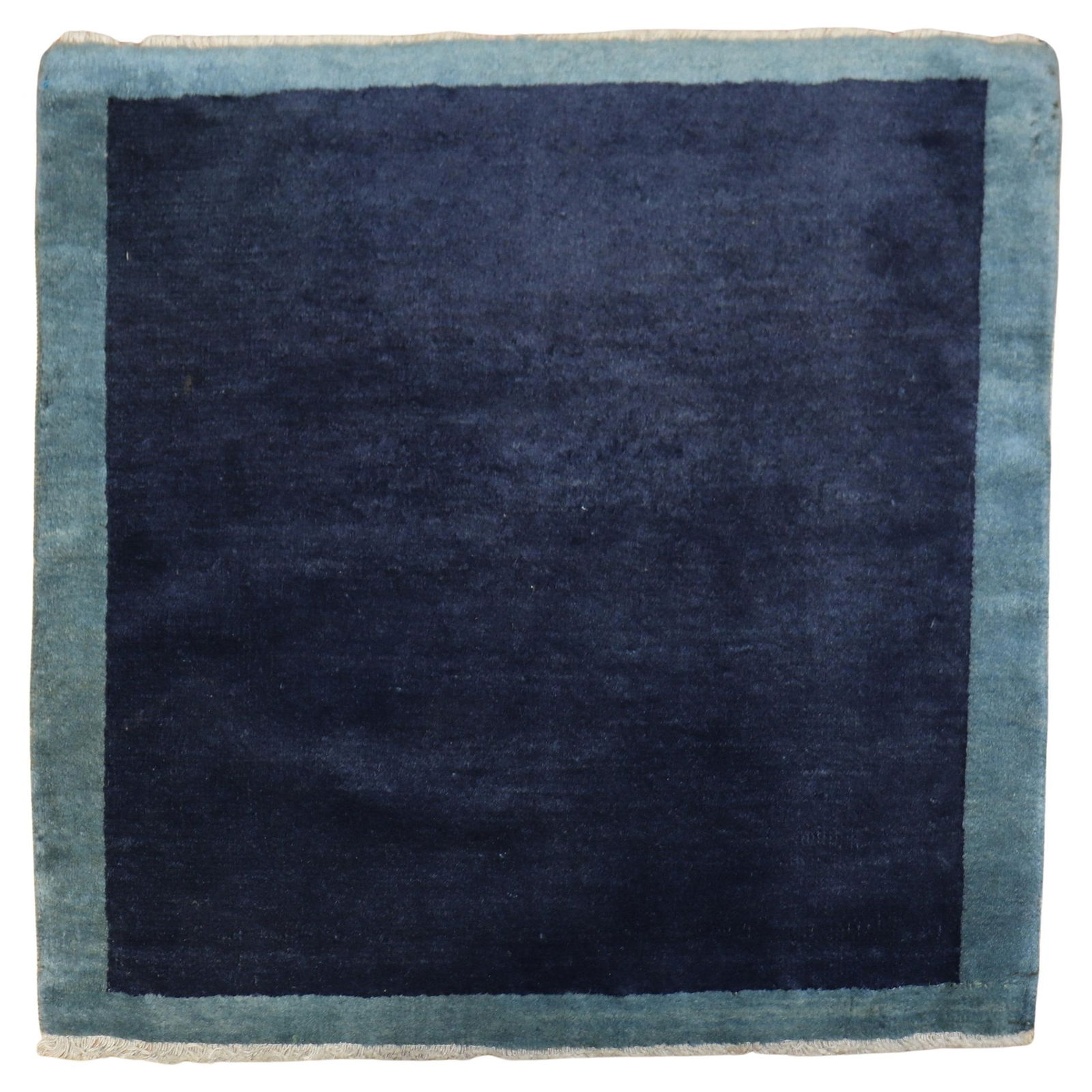Hand-Woven Blue Minimalist Vintage Chinese Rug 27 x 29: Hand-Woven Blue Minimalist Vintage Chinese Rug 27 x 29 This unique vintage Chinese rug features a minimalist design with a soothing blue palette. Hand-woven from high-quality wool, this rug embodies