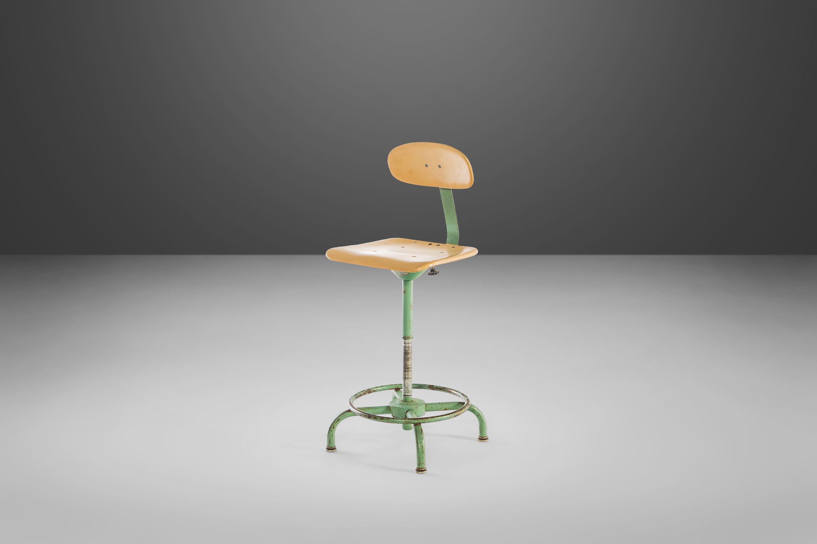 Mid Century Industrial Metal Drafting Stool by Adjusto Equipment 1940s: Mid Century Industrial Metal Drafting Stool by Adjusto Equipment 1940s This Mid Century Industrial Adjustable Metal Drafting Stool, crafted by Adjusto Equipment in the 1940s, showcases a robust build