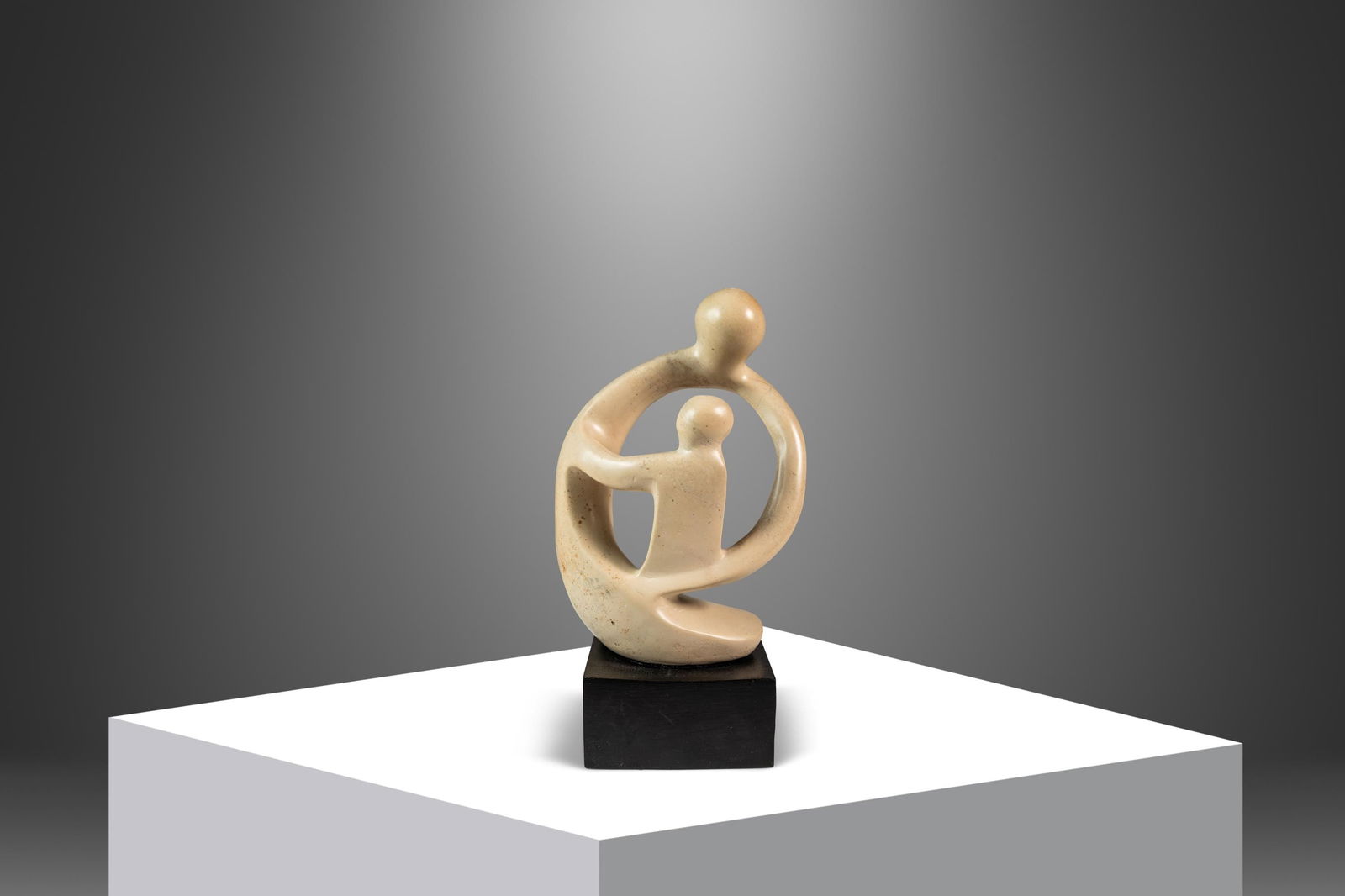 Mid-Century Marble Sculpture Parent & Child with Bentwood Base Kenya 1980s: Mid-Century Marble Sculpture Parent & Child with Bentwood Base Kenya 1980s This stunning Mid-Century Abstract Modern sculpture titled "Parent & Child" captures the essence of love and connection throu