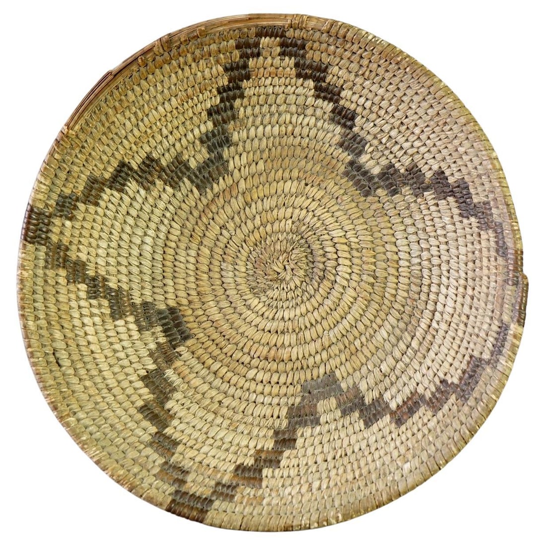 Antique 1920s Navajo Woven Low Basket 10" Diameter: Antique 1920s Navajo Woven Low Basket 10" Diameter Discover this exquisite Antique Southwest Navajo Decorated Low Basket, crafted circa 1920. This low bowl showcases traditional Navajo weaving techniq
