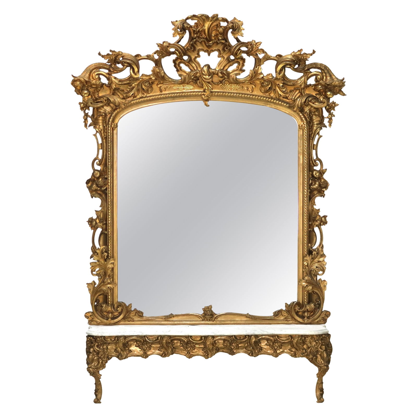 Monumental Louis XIV Style Giltwood Pier Mirror c1890 with Marble Top: Monumental Louis XIV Style Giltwood Pier Mirror c1890 with Marble Top This monumental pier mirror, crafted in the Louis XIV style circa 1890, is a stunning representation of late 19th-century artistry