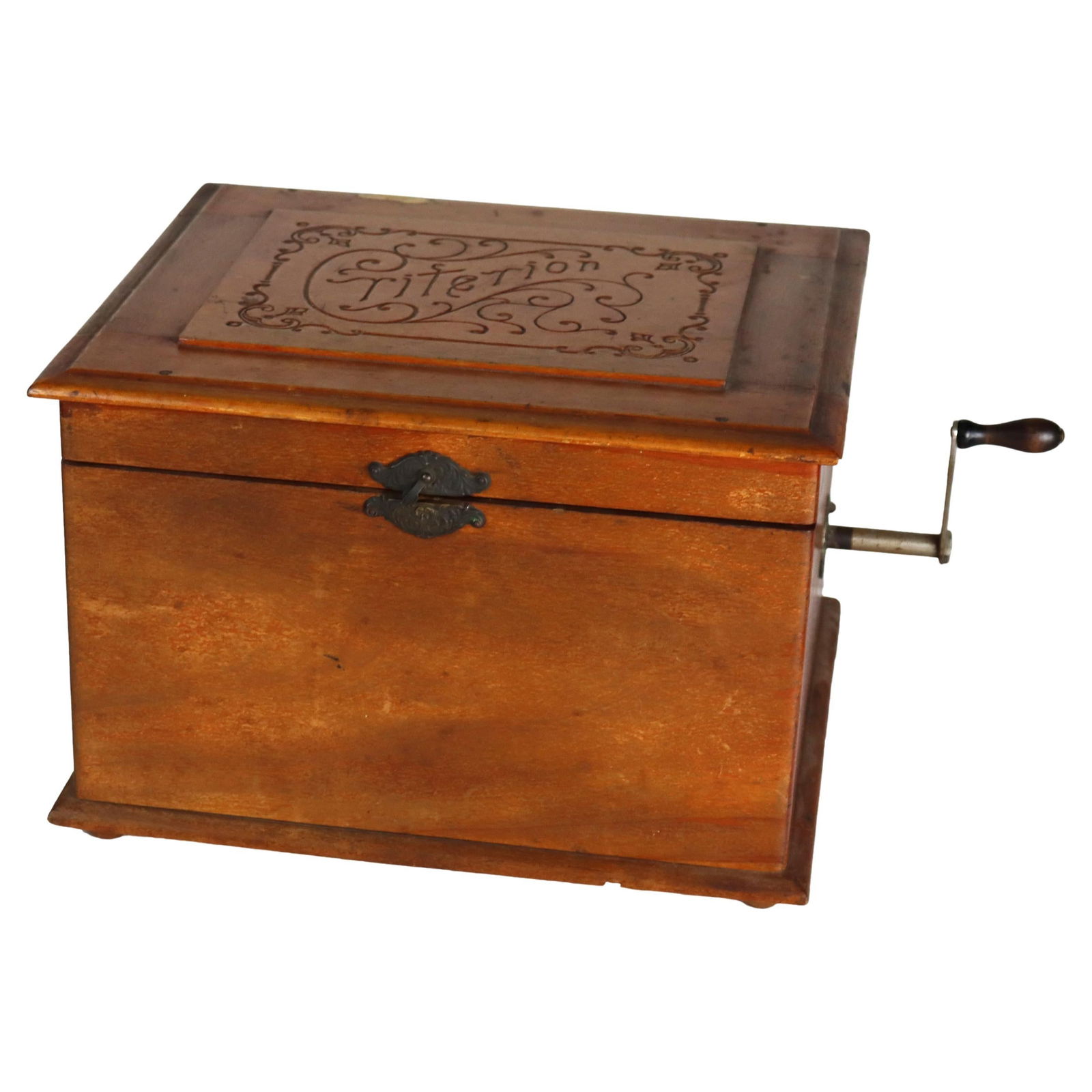 Late 19th Century Walnut Chip Carved Music Box with Criterion Inscription: Late 19th Century Walnut Chip Carved Music Box with Criterion Inscription This antique music box, dating to circa 1890, is crafted from walnut and features intricate chip carving on its lid with the w