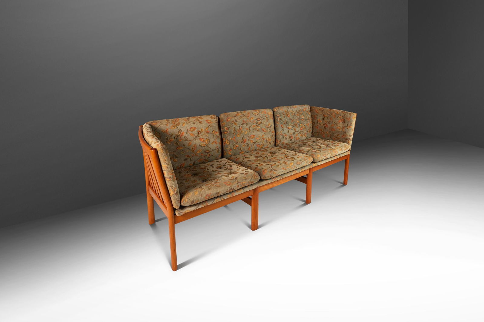 Model 333 Danish Modern Sofa by Schou Andersen in Beech and Floral Fabric: Model 333 Danish Modern Sofa by Schou Andersen in Beech and Floral Fabric Introducing the Model 333 Danish Mid-Century Modern Three-Seater Sofa, a stunning piece designed by Schou Andersen, crafted in
