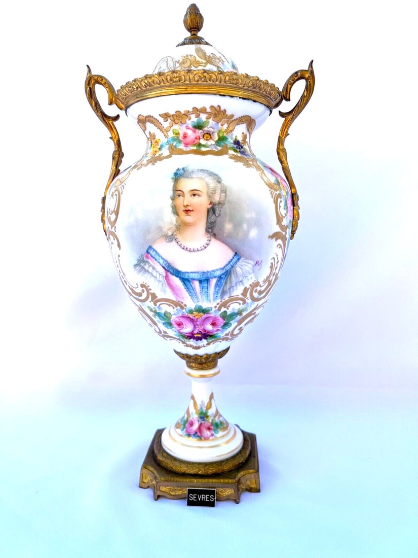 19th Century Sevres Hand Painted Urn Marie Leszczynska Floral Porcelain: 19th Century Sevres Hand Painted Urn Marie Leszczynska Floral Porcelain This exquisite late 19th century French Sevres urn is a stunning example of Victorian Art Nouveau craftsmanship. Hand painted wi