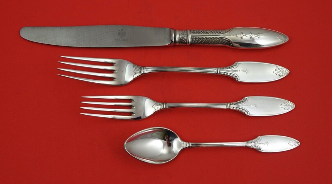 Faberge Grand Europa Sterling Silver 4-Piece Dinner Set: Faberge Grand Europa Sterling Silver 4-Piece Dinner Set Elevate your dining experience with this exquisite 4-piece place setting from the renowned Faberge, featuring the elegant Grand Europa pattern.