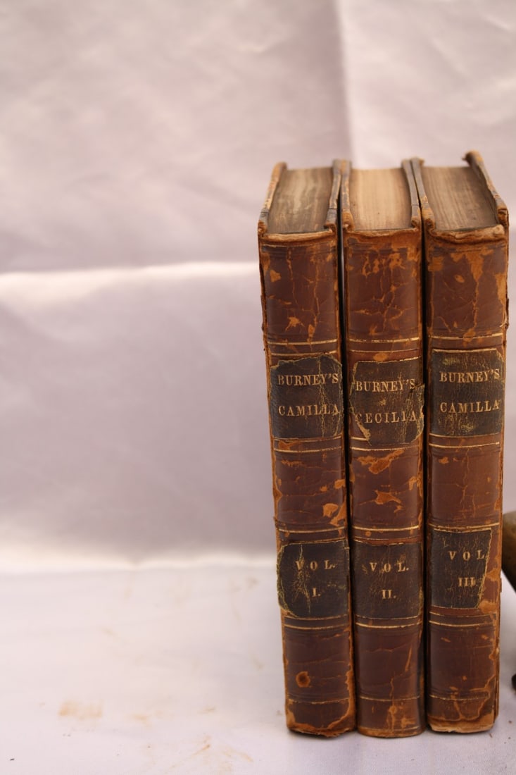 1797 1st Edition Leather Bound Camilla by Frances Burney Rare Set: 1797 1st Edition Leather Bound Camilla by Frances Burney Rare Set Discover a rare gem for literature enthusiasts: a magnificent 1797 original first edition of 'Camilla' by Frances Burney, renowned Eng