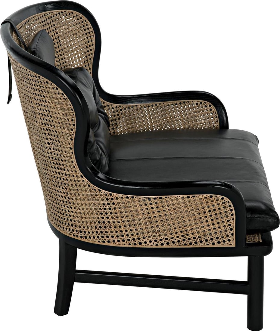 Noir Marabu Sungkai Wood Armchair with Cane Black Charcoal Finish: Noir Marabu Sungkai Wood Armchair with Cane Black Charcoal Finish This elegant Sungkai Wood Armchair showcases a refined English Traditional style, ideal for various decor settings. Its sturdy frame i