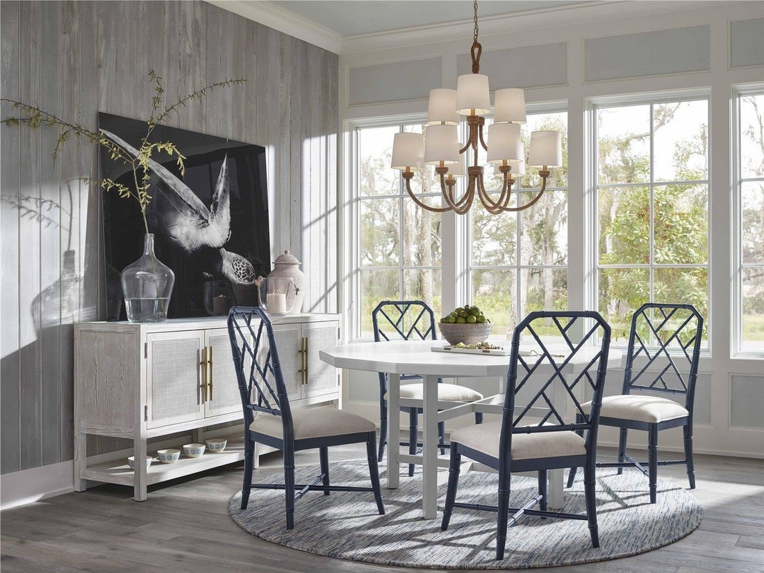 Universal Hanalei Bay Chair with Cerulean Blue Upholstery: Universal Hanalei Bay Chair with Cerulean Blue Upholstery Introducing the Hanalei Bay Chair, a stunning addition to your living space. This stylish side chair features a plush upholstered seat, offeri