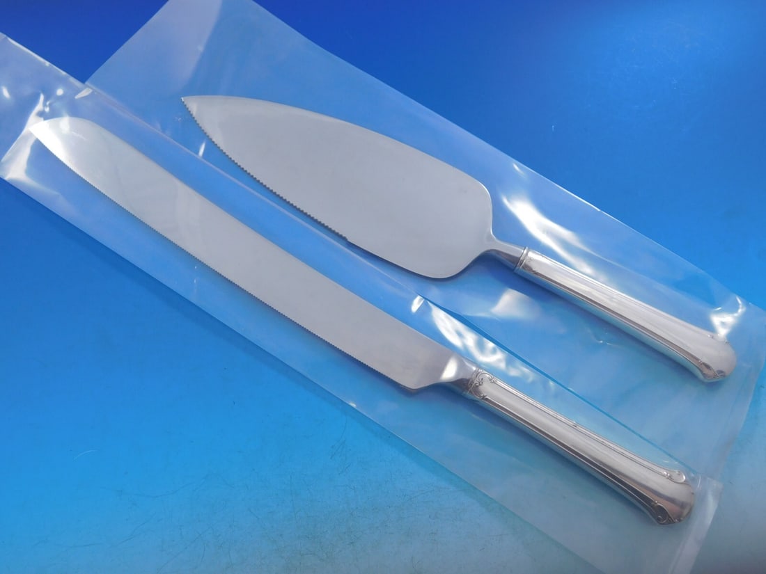 Towle Chippendale Sterling Silver Wedding Cake Set 2pc Custom Made: Towle Chippendale Sterling Silver Wedding Cake Set 2pc Custom Made This exquisite Chippendale wedding cake set by Towle is a stunning addition to any wedding or special occasion. Crafted from sterling