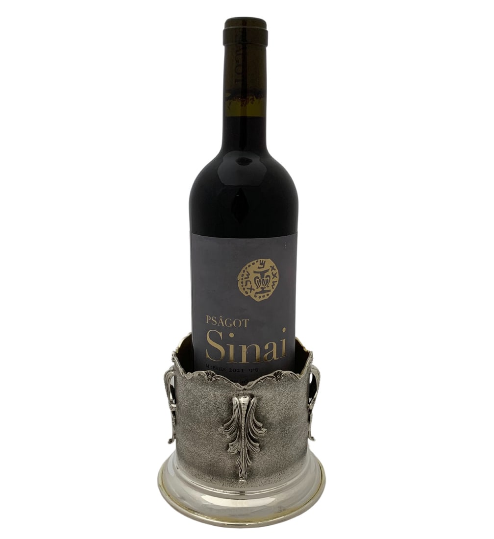 Handmade 925 Sterling Silver Multi Leaf Applique Bottle Holder: Handmade 925 Sterling Silver Multi Leaf Applique Bottle Holder This exquisite bottle holder is crafted from fine 925 sterling silver, showcasing a stunning handmade design with multi leaf appliques.