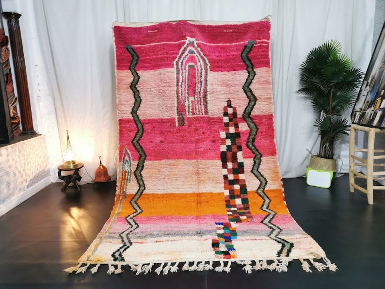 Handwoven Moroccan Rug 6.56 x 3.28 Feet 100% Wool: Handwoven Moroccan Rug 6.56 x 3.28 Feet 100% Wool This Elegant Colorful Rug is a unique piece handwoven in the Atlas Mountains by skilled local Berber women weavers. Crafted using traditional methods