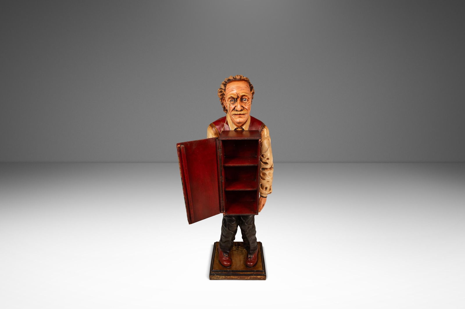 Rare Lifesize Albert Einstein Statue with Storage Cabinet 1980s: Rare Lifesize Albert Einstein Statue with Storage Cabinet 1980s This rare vintage lifesize statue of Albert Einstein captures the iconic theoretical physicist in exquisite detail, featuring him carryi