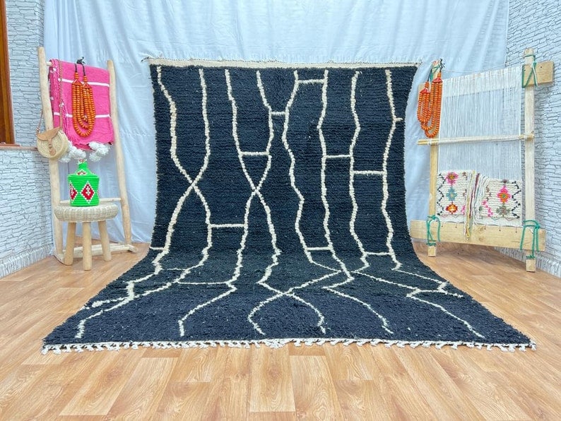 Authentic Handwoven Black Rug 100% Sheep Wool Morocco: Authentic Handwoven Black Rug 100% Sheep Wool Morocco Discover the beauty of this authentic Black Rug, handwoven by local Berber women weavers in the Atlas Mountains of Morocco. Crafted using traditio