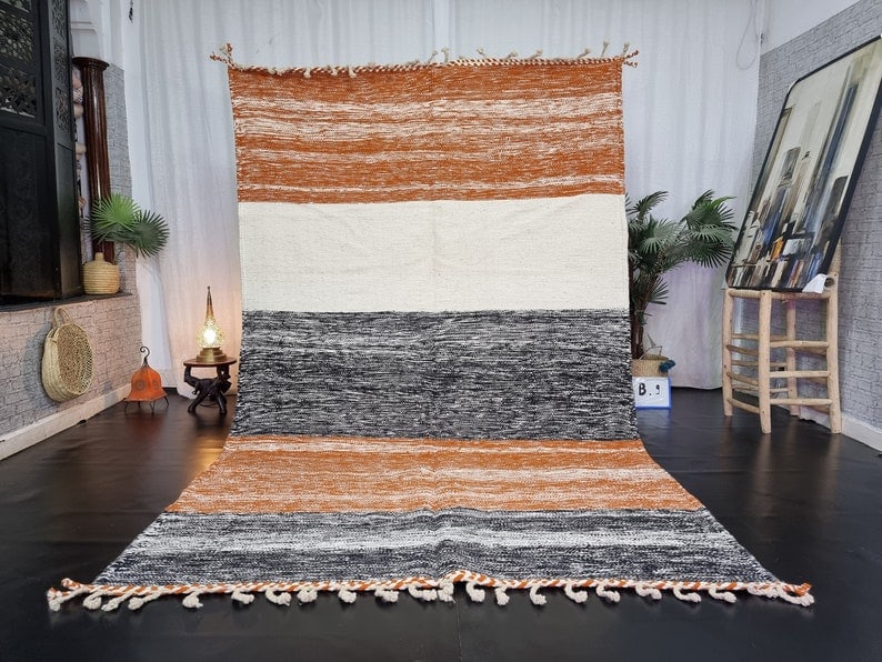 Authentic Handwoven Berber Rug 10 x 5 Feet Morocco: Authentic Handwoven Berber Rug 10 x 5 Feet Morocco Enhance your space with this Stylish Authentic Rug, handwoven in the stunning Atlas Mountains by skilled local Berber women weavers. Crafted using tr