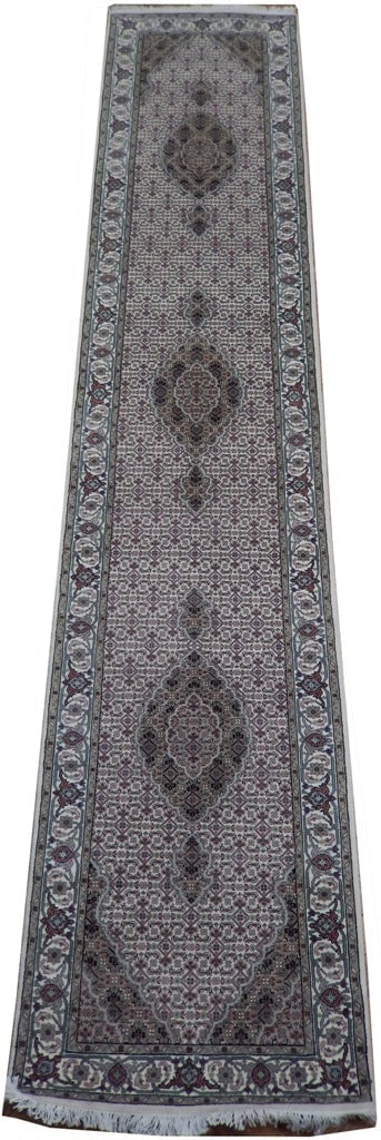 Elegant 2' x 12' Ivory Wool Silk Tabriz Mahi Runner Rug: Elegant 2' x 12' Ivory Wool Silk Tabriz Mahi Runner Rug Free continental US Shipping Enhance your home decor with this stunning 2' x 12' Ivory Wool & Silk Tabriz Mahi Runner Rug. Crafted from a luxuri