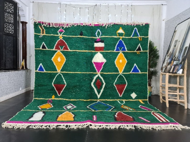 Handwoven Green Rug 100% Sheep Wool Moroccan Berber Design: Handwoven Green Rug 100% Sheep Wool Moroccan Berber Design Discover the beauty of this handmade authentic green rug, featuring intricate patterns and vibrant colors. Handwoven in the Middle Atlas Moun